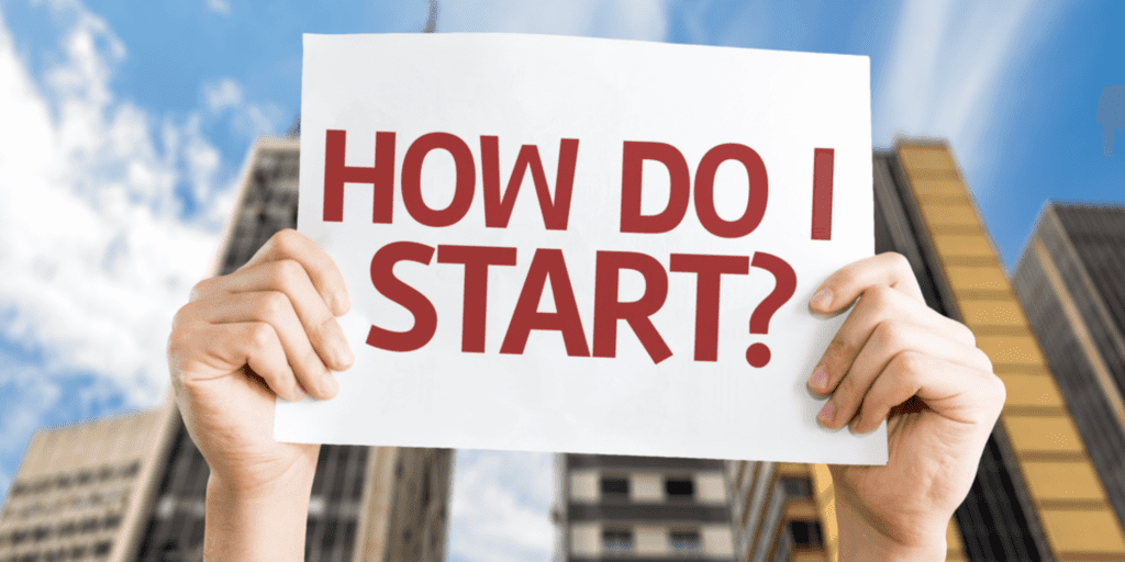 a hand holding a poster with text How Do I start