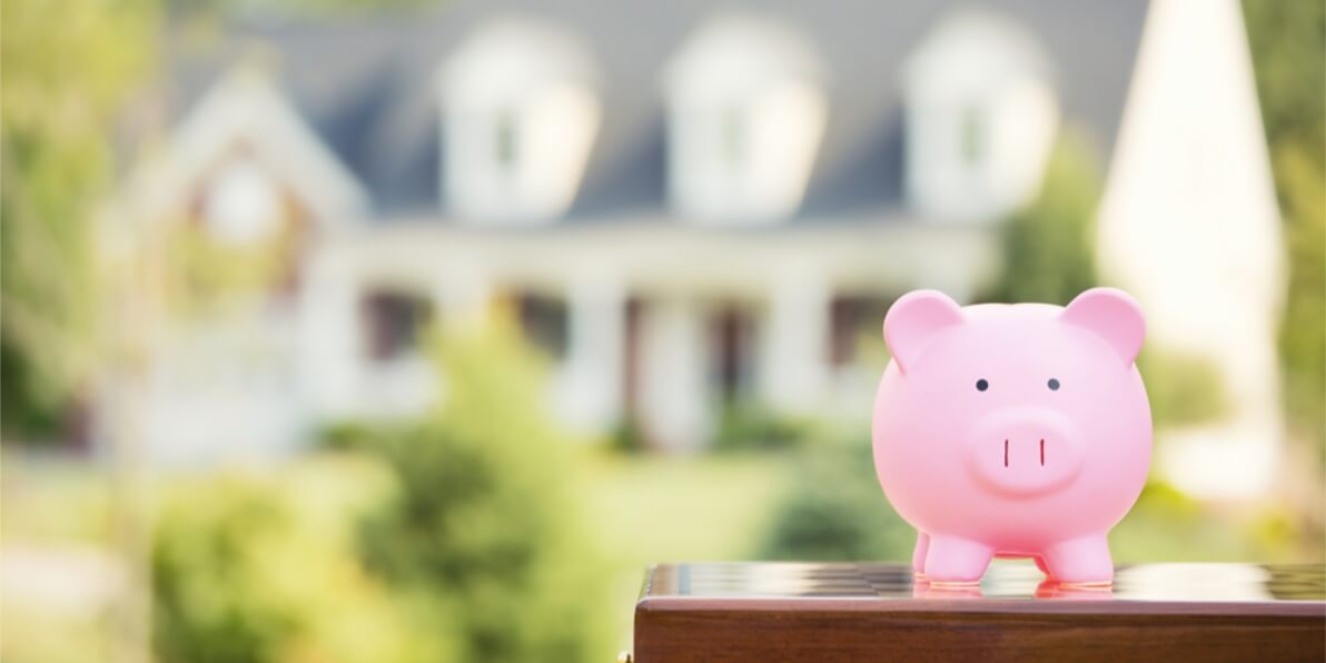 a pink piggy bank on table