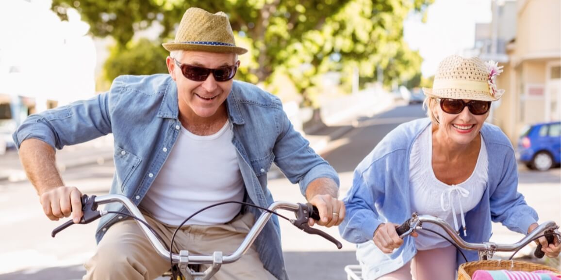 couple riding on their bicycle