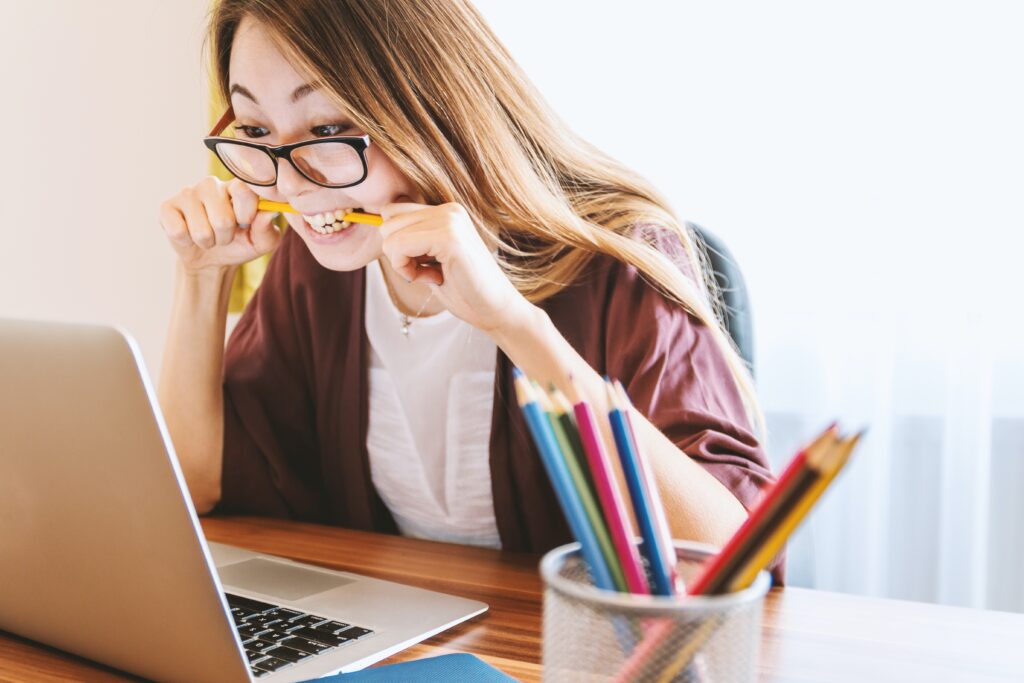 student studying on her laptop