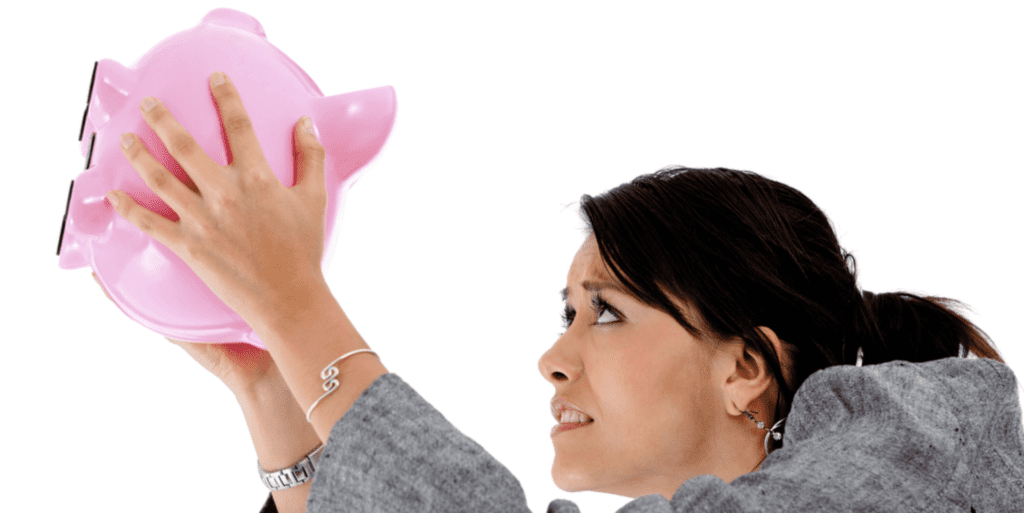 image of person looking on her piggy bank