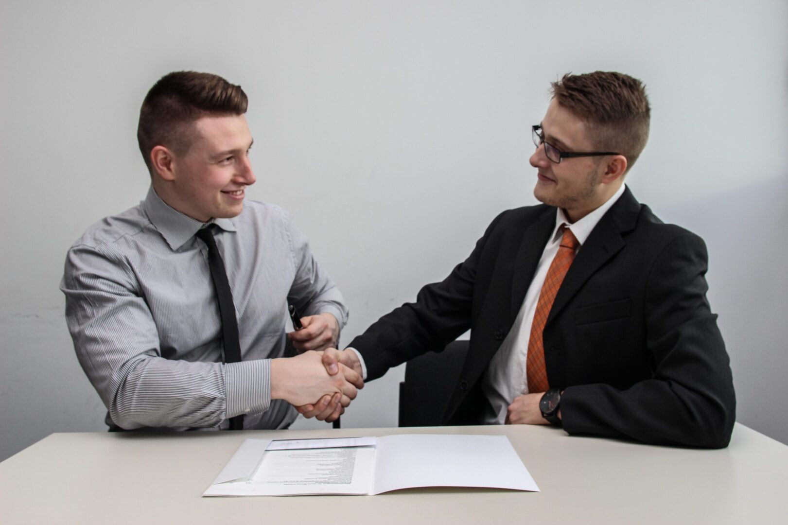 co-workers shaking hand